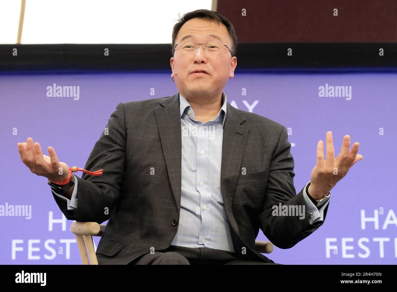 Hay Festival, Hay on Wye, Wales, UK – Sunday 28th May 2023 – Author Tan Twan Eng on stage talking about his book The House of Doors - Photo Steven May / Alamy Live News Stock Photo