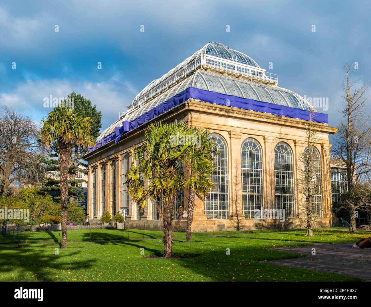 Victrian glasshouse wrapped with a bow for celebration, Roayl Botanic Gardens, Edinburgh, Scotland, UK Stock Photo