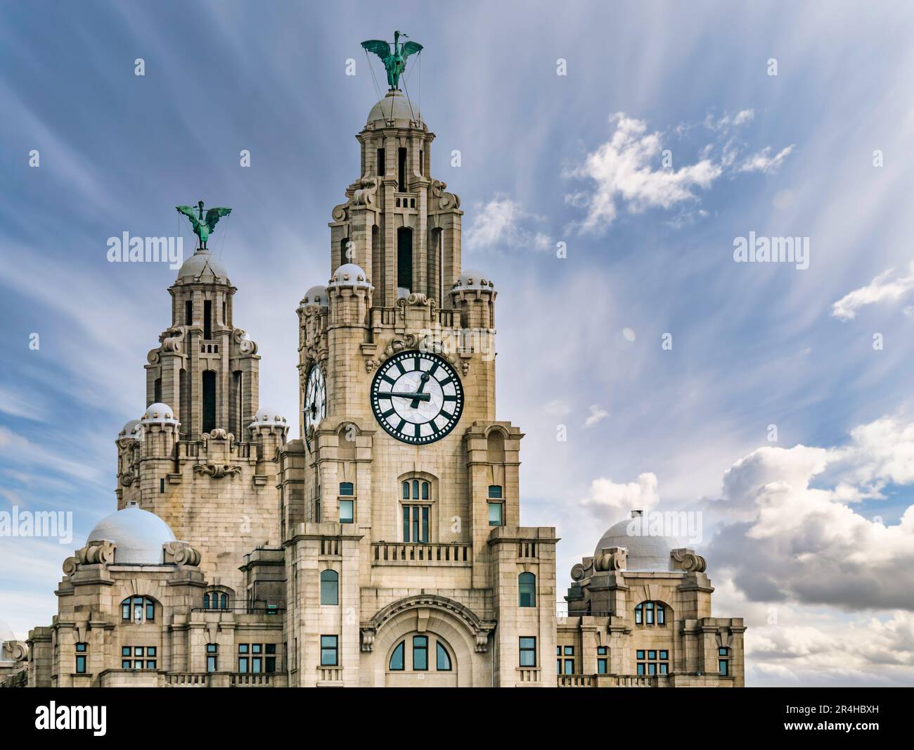 Close up view of clock towers of Royal Liver building with cormorant Liver Birds and UK's largest clocks, Pier Head, Liverpool, England, UK Stock Photo
