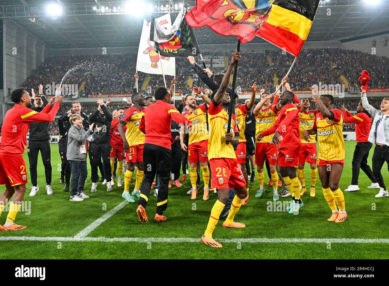 President Joseph Oughourlian of RC Lens pictured celebrating with his  players of RC Lens after winning a soccer game between t Racing Club de Lens  and AC Ajaccio, on the 37th matchday