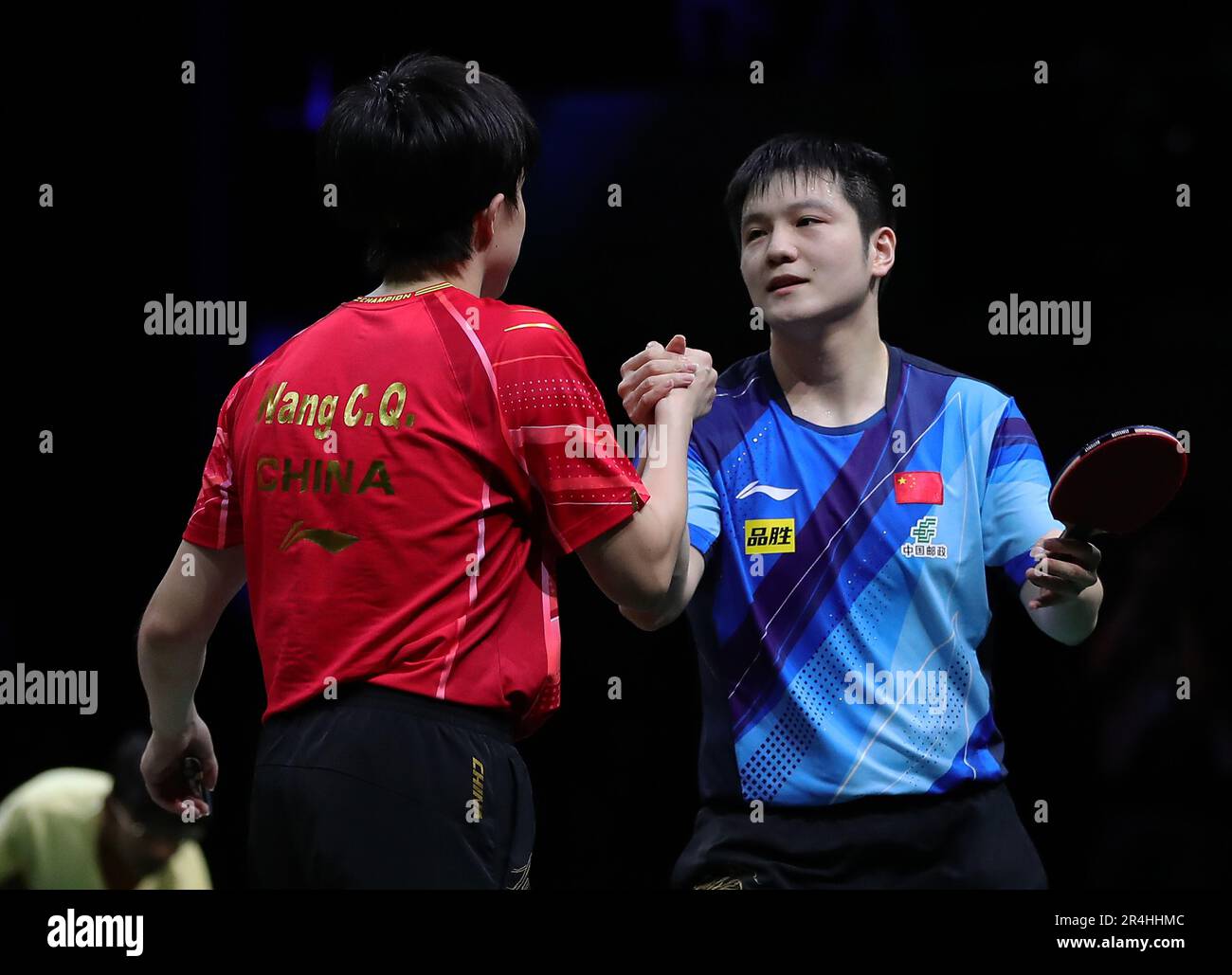 Durban, South Africa. 28th May, 2023. Fan Zhendong of China (R) greets