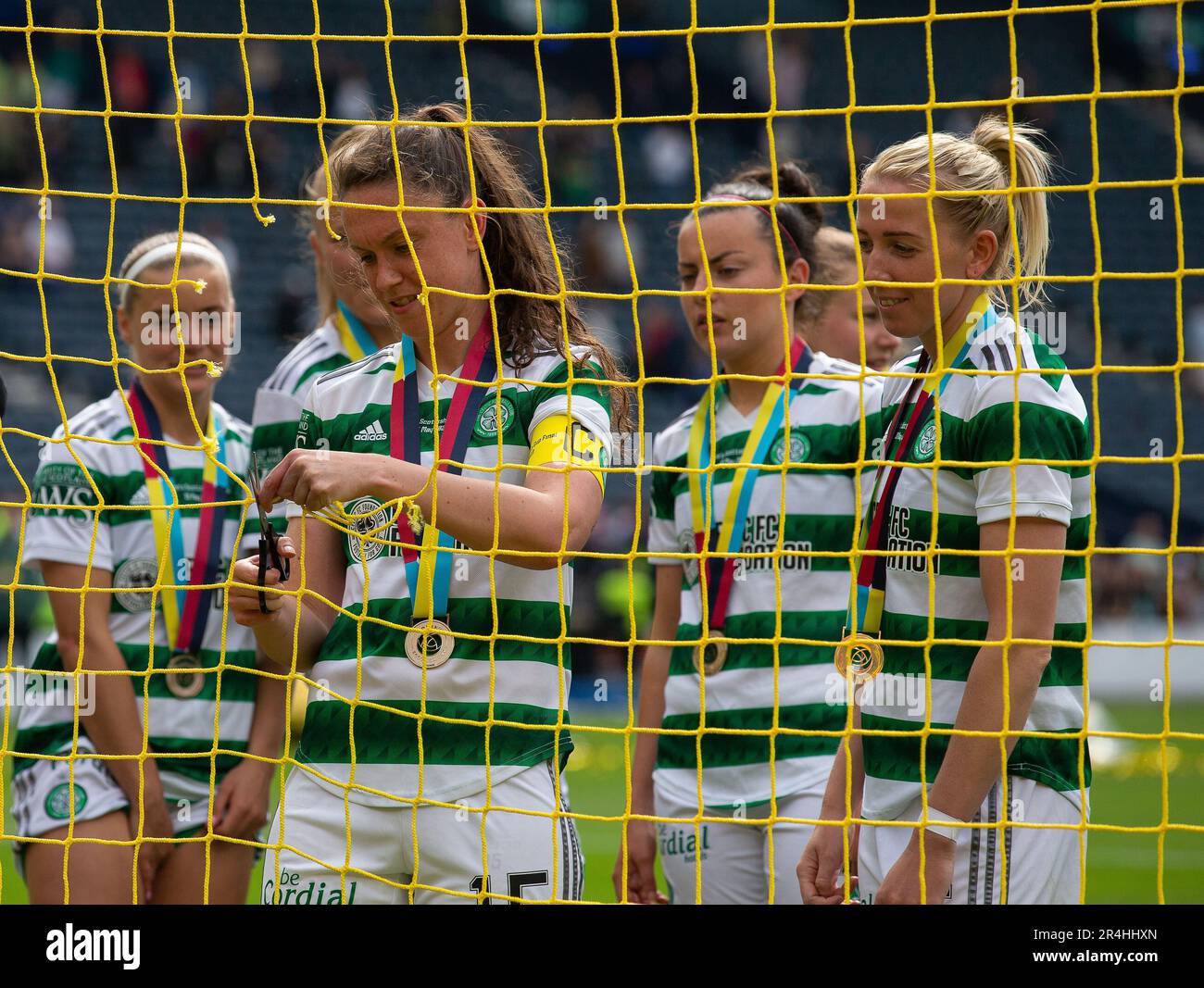 Glasgow, UK. 28th May 2023. 28th May 2023;  Hampden Park, Glasgow, Scotland: Womens Scottish Cup Football Final, Celtic versus Rangers; Kelly Clark of Celtic cuts out a piece of the net at Hampden Credit: Action Plus Sports Images/Alamy Live News Stock Photo