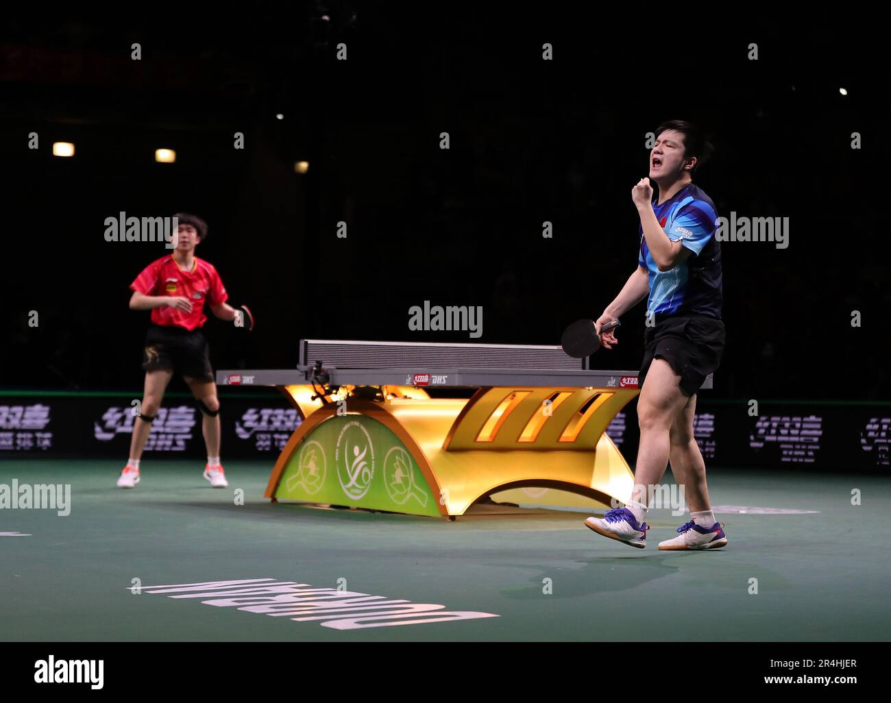 Durban, South Africa. 28th May, 2023. Fan Zhendong (R) of China reacts
