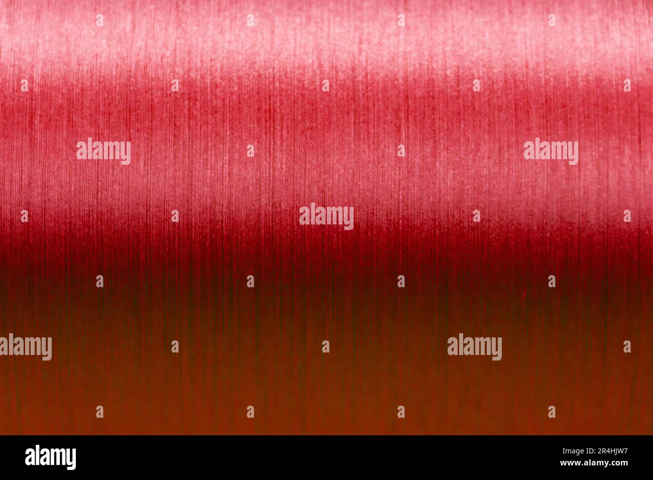 Closed up of red color of thread textured background (Focus at center ...