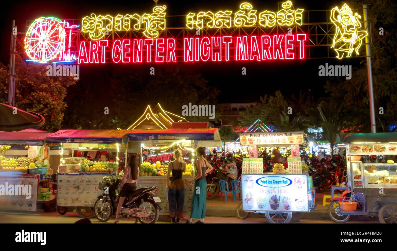 Siem Reap, Cambodia, December, 2018. Several young girls near the stalls at the Siem Reap Night Market. Stock Photo