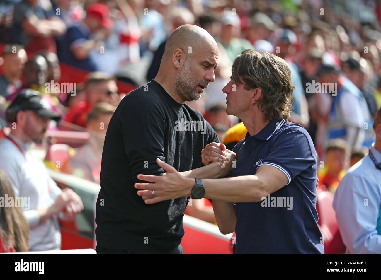 London, UK. 28th May, 2023. Manager Josep Guardiola of Manchester City and Manager Thomas Frank of Brentford shakes before kick off during the Premier League match between Brentford and Manchester City at Gtech Community Stadium, London, England on 28 May 2023. Photo by Pedro Soares. Editorial use only, license required for commercial use. No use in betting, games or a single club/league/player publications. Credit: UK Sports Pics Ltd/Alamy Live News Stock Photo