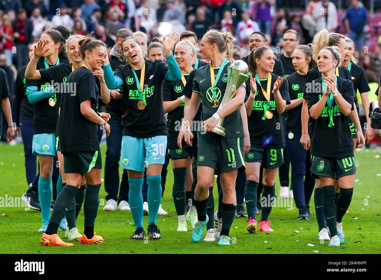 Cologne, Germany. 18th May, 2023. Players of VFL Wolfsburg with Alexandra Popp (11 Wolfsburg) celebrate their victory of the Cup Final and pose with their medals and trophy during the DFB Pokal Final football match between VFL Wolfsburg and SC Freiburg at RheinEnergieSTADION in Cologne, Germany. (Daniela Porcelli/SPP) Credit: SPP Sport Press Photo. /Alamy Live News Stock Photo