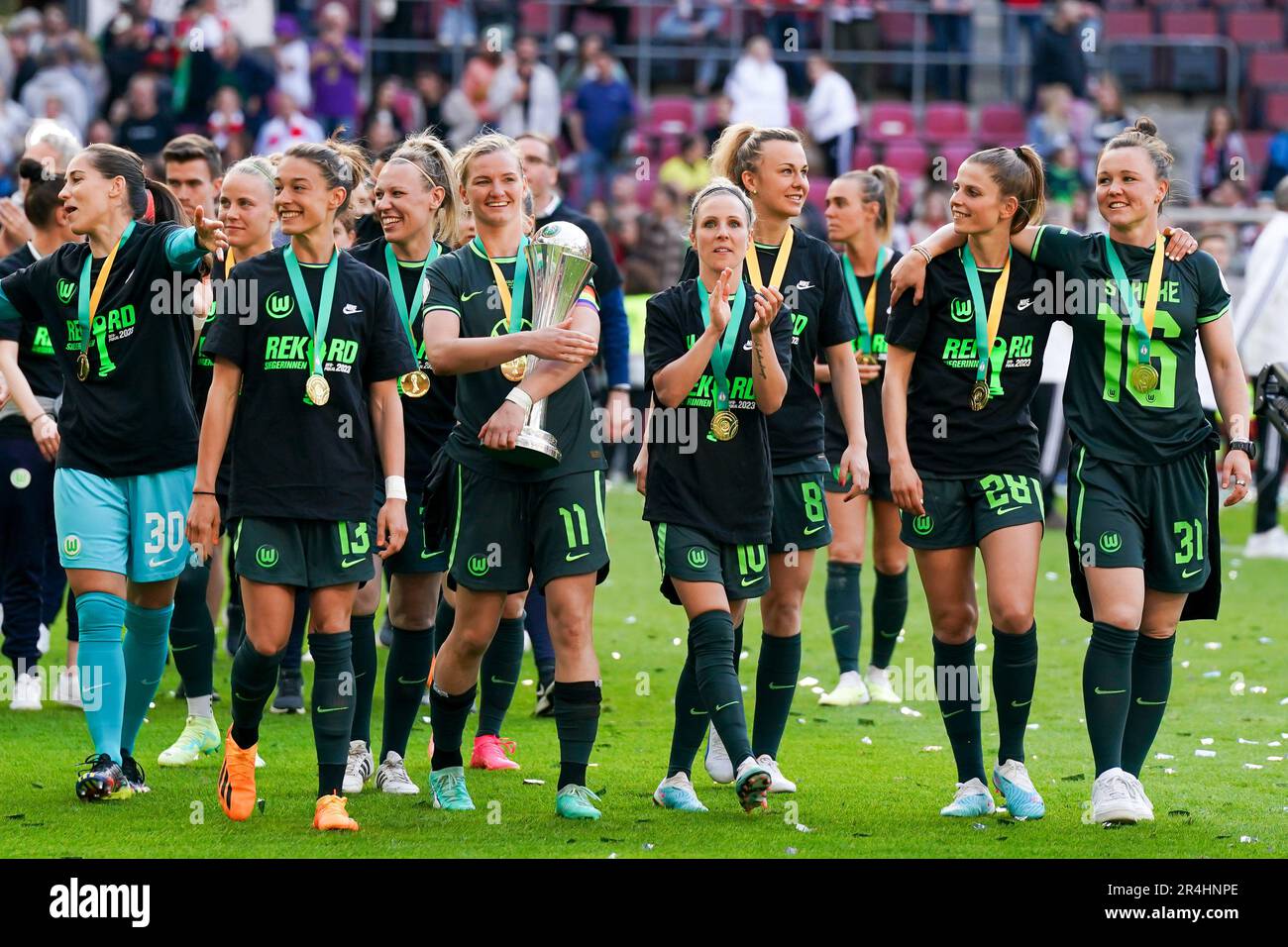 Cologne, Germany. 18th May, 2023. Players of VFL Wolfsburg with Alexandra Popp (11 Wolfsburg) celebrate their victory of the Cup Final and trophy during the DFB Pokal Final football match between VFL Wolfsburg and SC Freiburg at RheinEnergieSTADION in Cologne, Germany. (Daniela Porcelli/SPP) Credit: SPP Sport Press Photo. /Alamy Live News Stock Photo