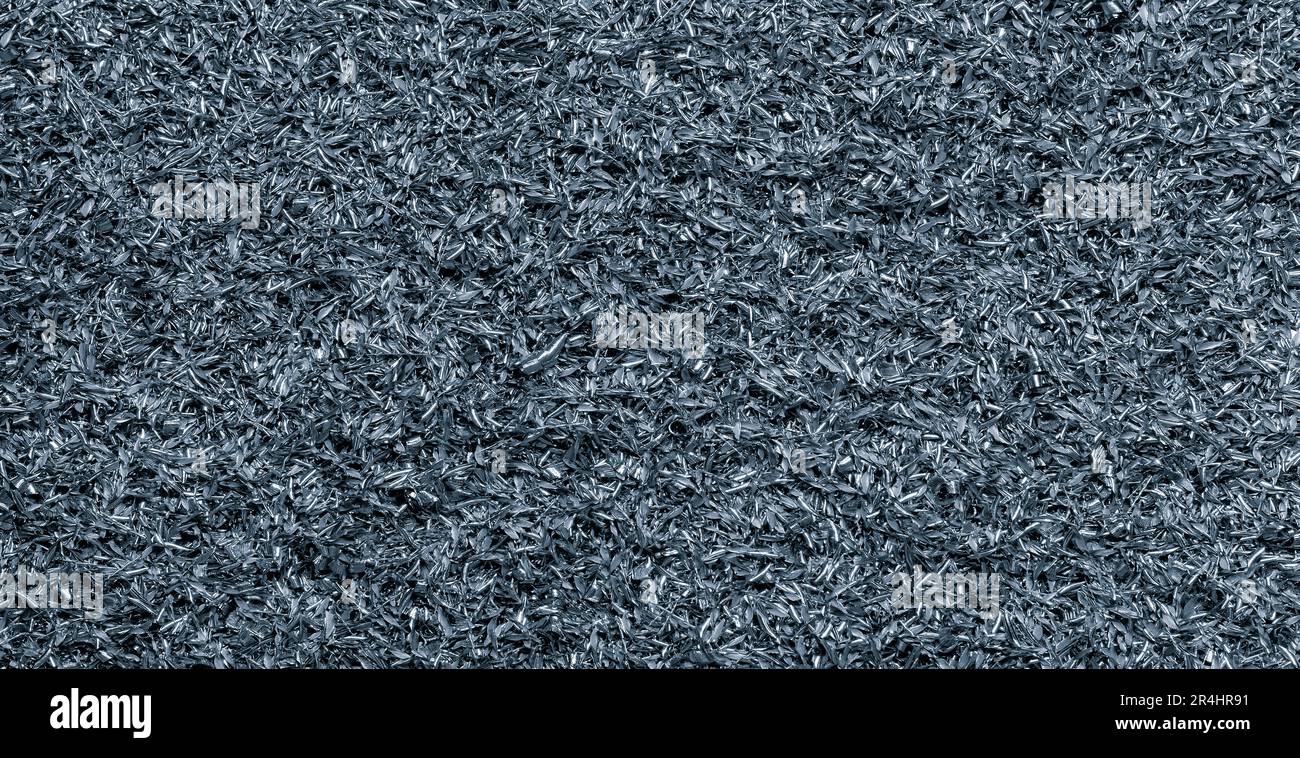Blue stainless steel texture metal background, rusty scrap metal shavings swirls in blue tone. industry metal processing concept blue  background.  me Stock Photo