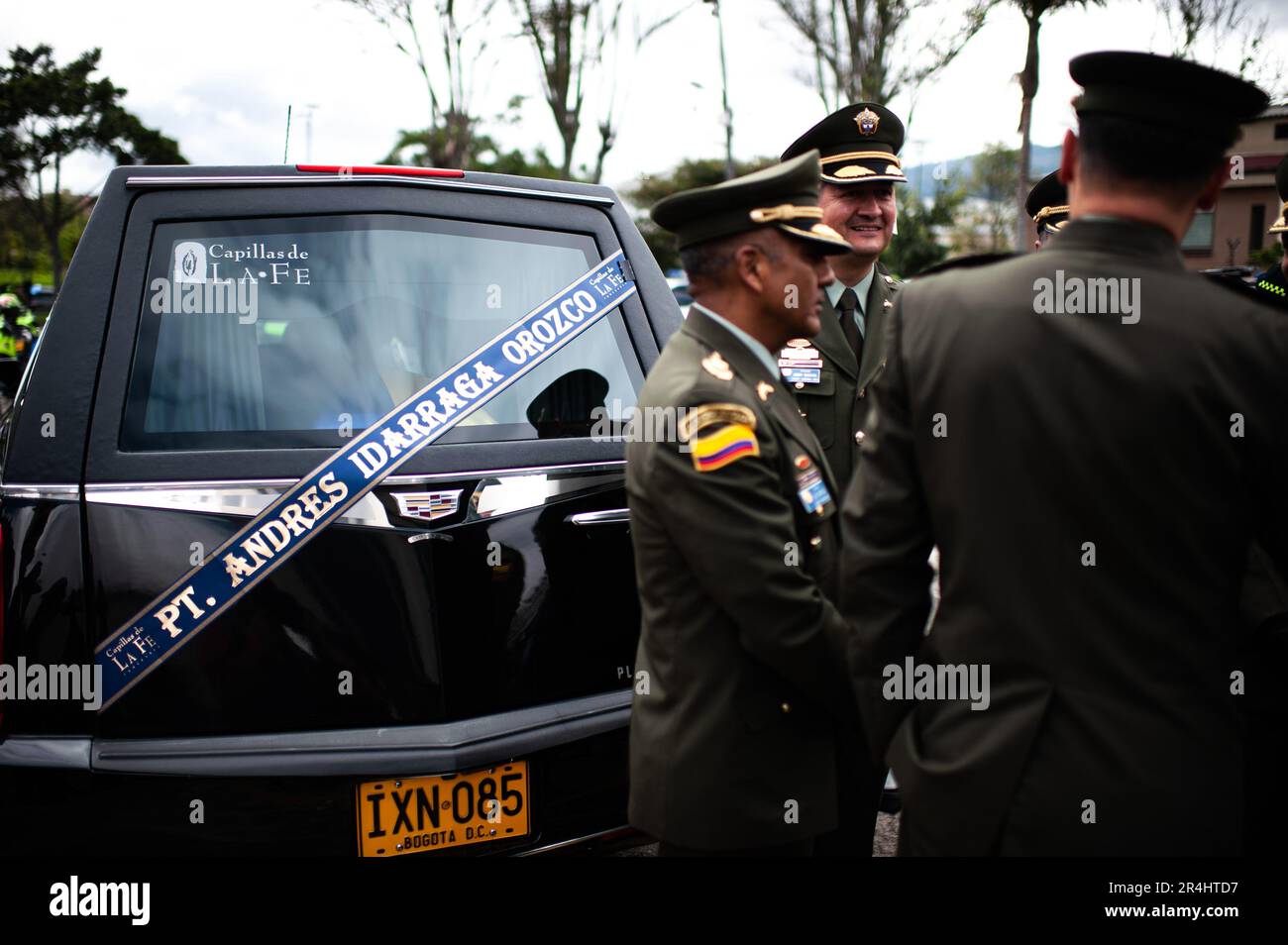 Bogota, Colombia. 28th May, 2023. Colombia's police officials stand on the side of the hearse during the funeral honors to police officer Andres Idarraga Orozco killed in a guerrilla bomb attack in Tibu, Norte de Santander, in Bogota, Colombia, may 28, 2023. Photo by: Sebastian Barros/Long Visual Press Credit: Long Visual Press/Alamy Live News Stock Photo