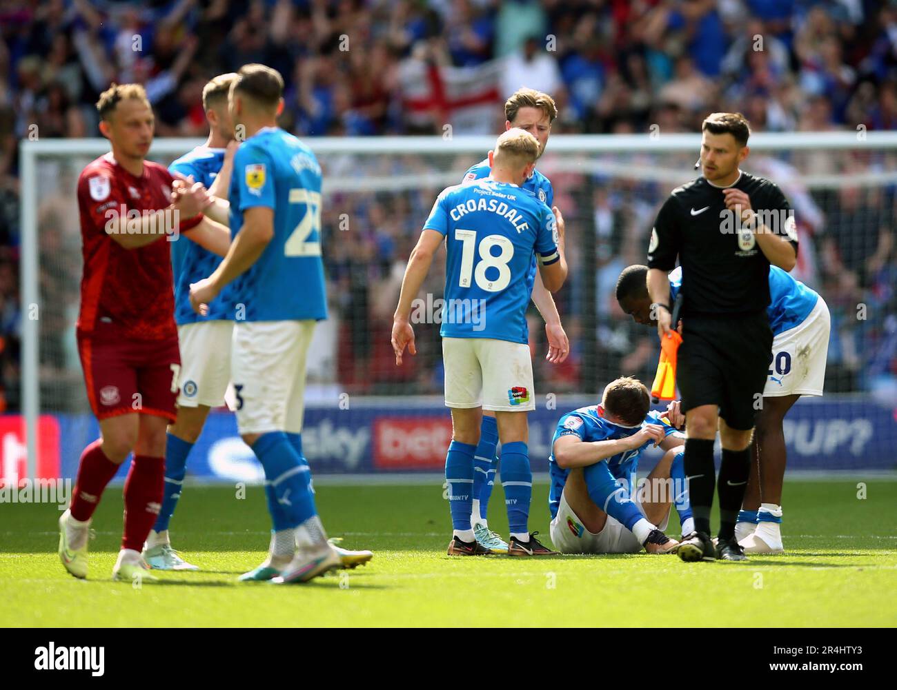 Stockport County players dejected following the Sky Bet League Two play
