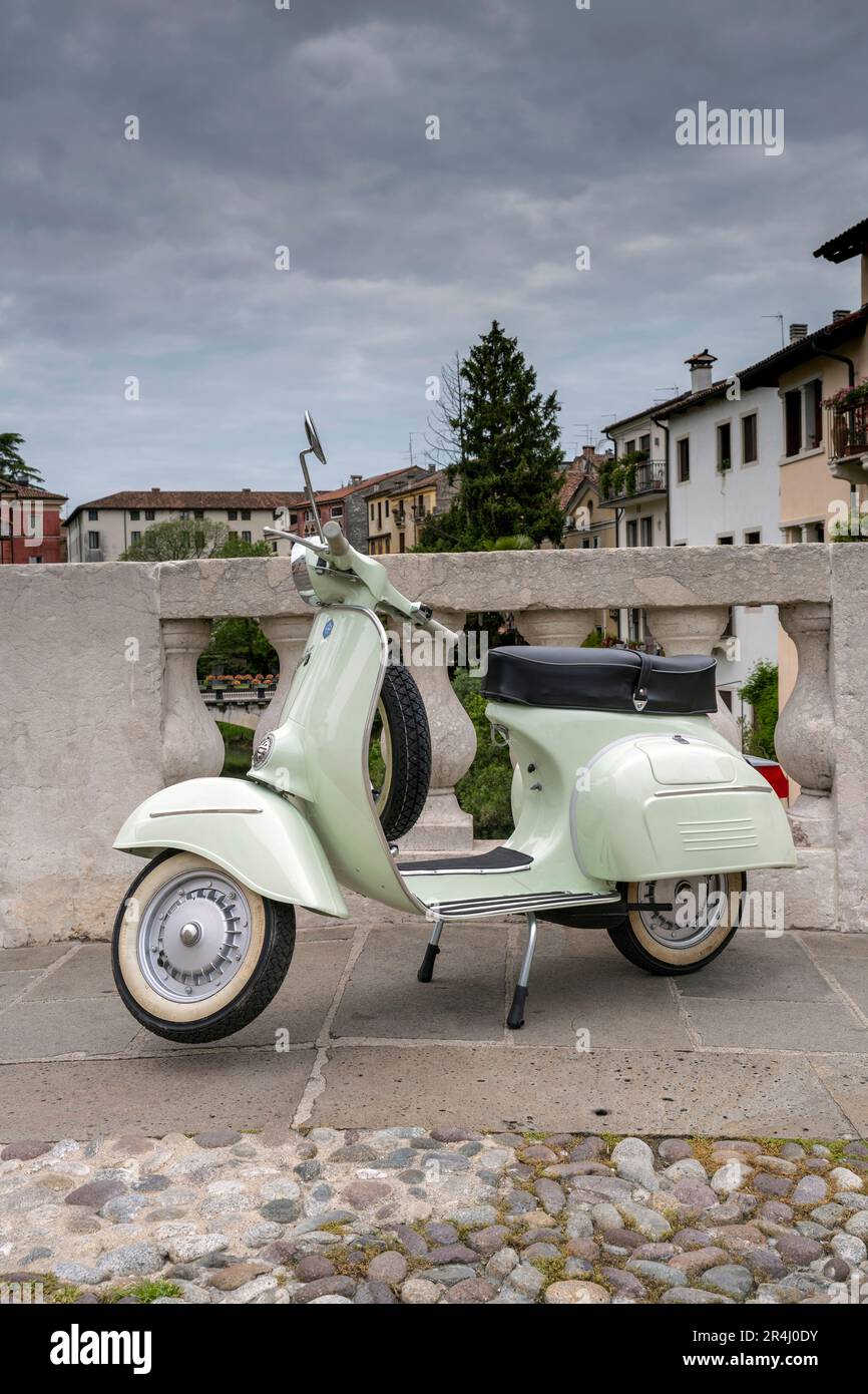 Piaggio Vespa scooter parked in the old town, Vicenza, Veneto, Italy Stock Photo