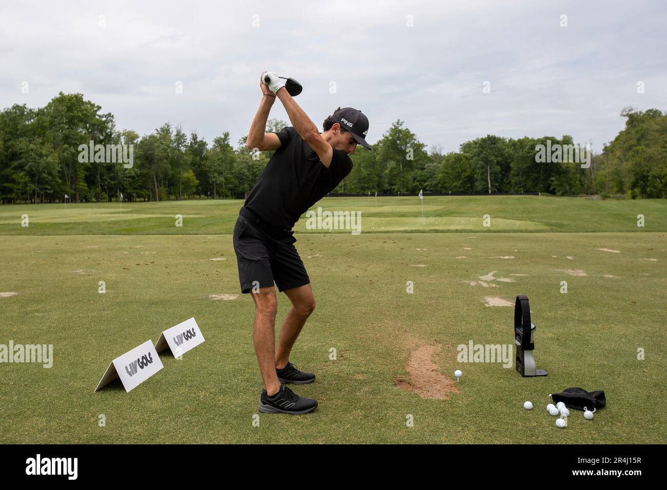 Captain Joaquín Niemann of Torque GC plays a shot on the driving range