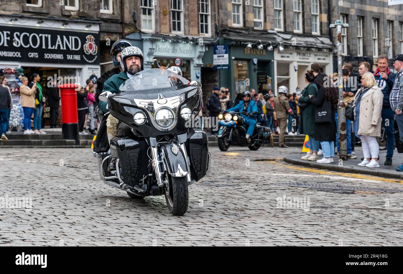 Men driving classic motorcycle in Distinguished Gentlemen's Ride, Royal