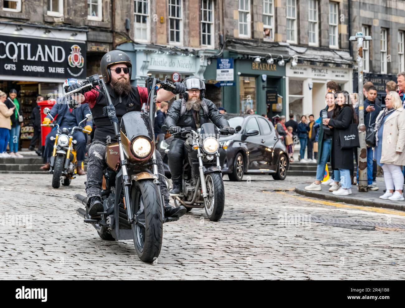 Man driving classic motorcycle in Distinguished Gentlemen's Ride, Royal