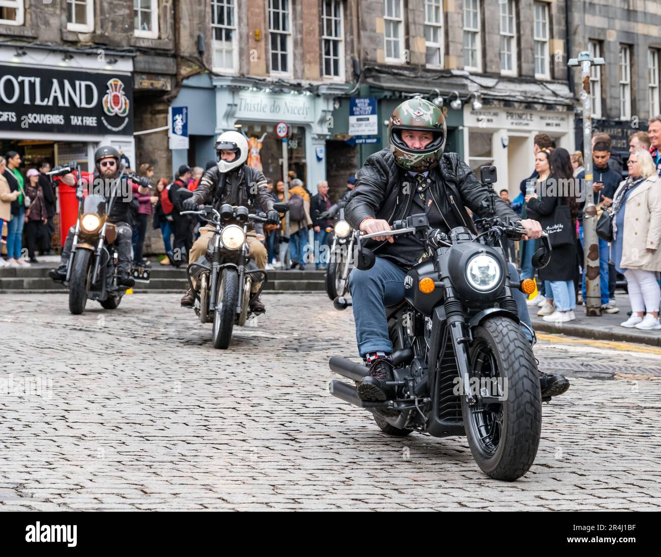 Men driving classic motorcycle in Distinguished Gentlemen's Ride, Royal