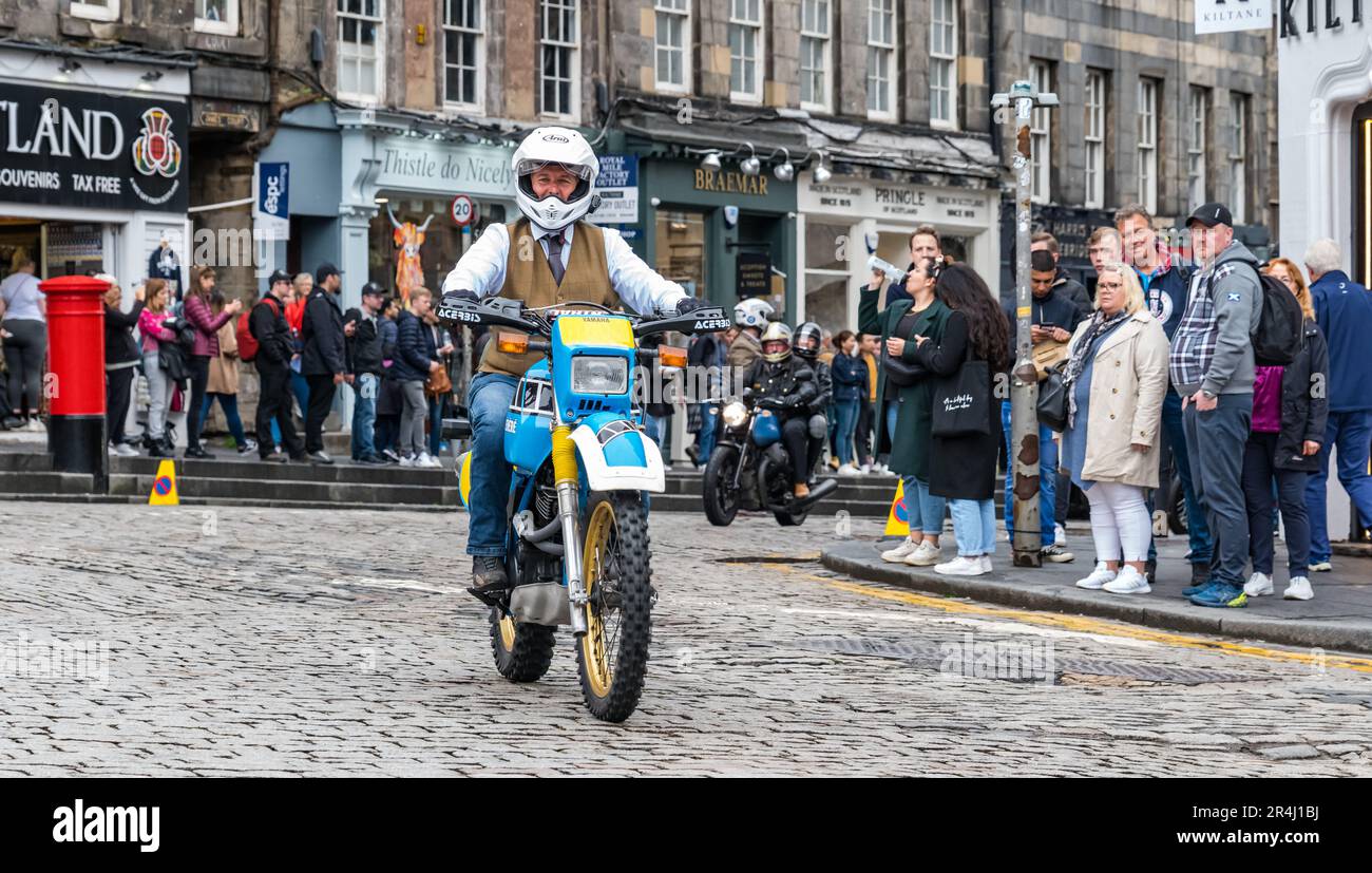 Man driving classic motorcycle in Distinguished Gentlemen's Ride, Royal