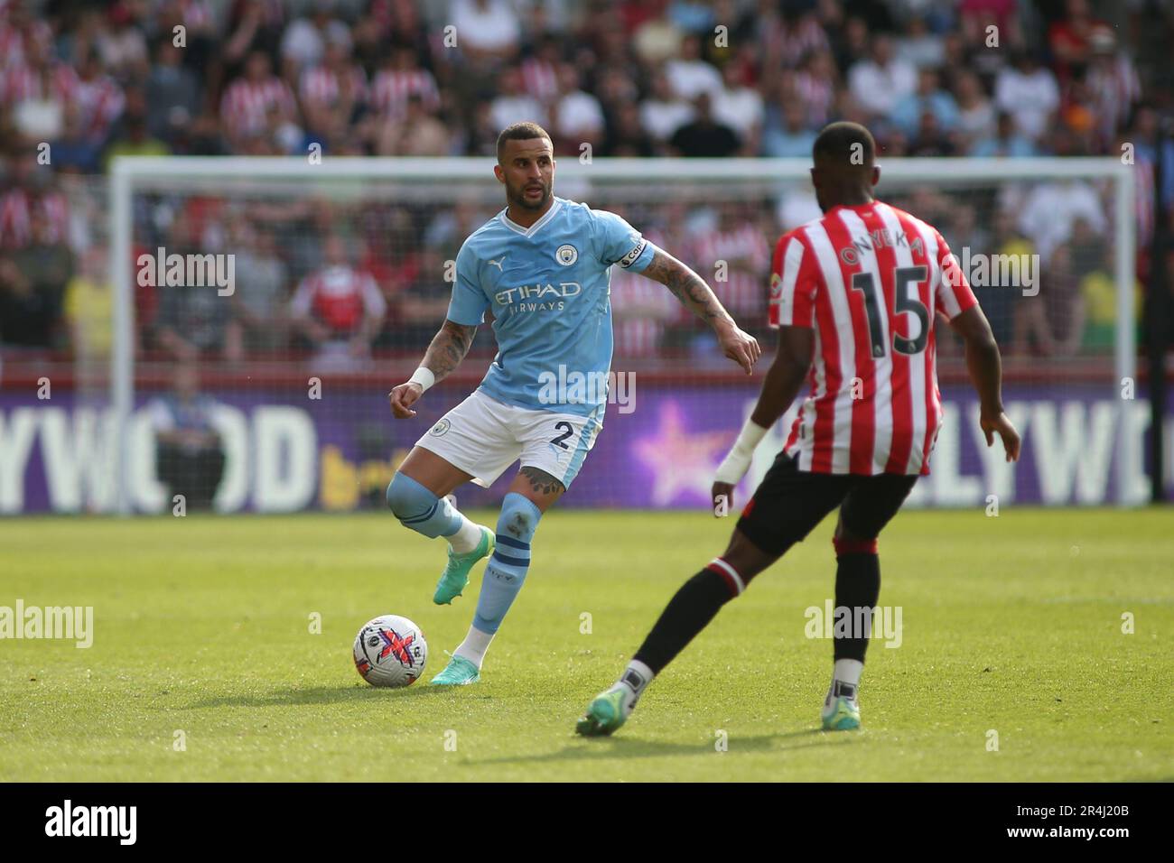 London, UK. 28th May, 2023. Kyle Walker of Manchester City defended by Frank Onyeka of Brentford during the Premier League match between Brentford and Manchester City at Gtech Community Stadium, London, England on 28 May 2023. Photo by Pedro Soares. Editorial use only, license required for commercial use. No use in betting, games or a single club/league/player publications. Credit: UK Sports Pics Ltd/Alamy Live News Stock Photo