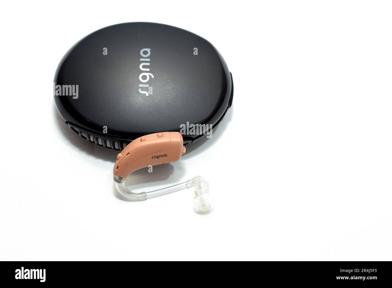 Cairo, Egypt, May 15 2023: Signia hearing aid siemens for seniors adults to improve hearing impairments and loss SNHL, a perfect solution for elderly, Stock Photo