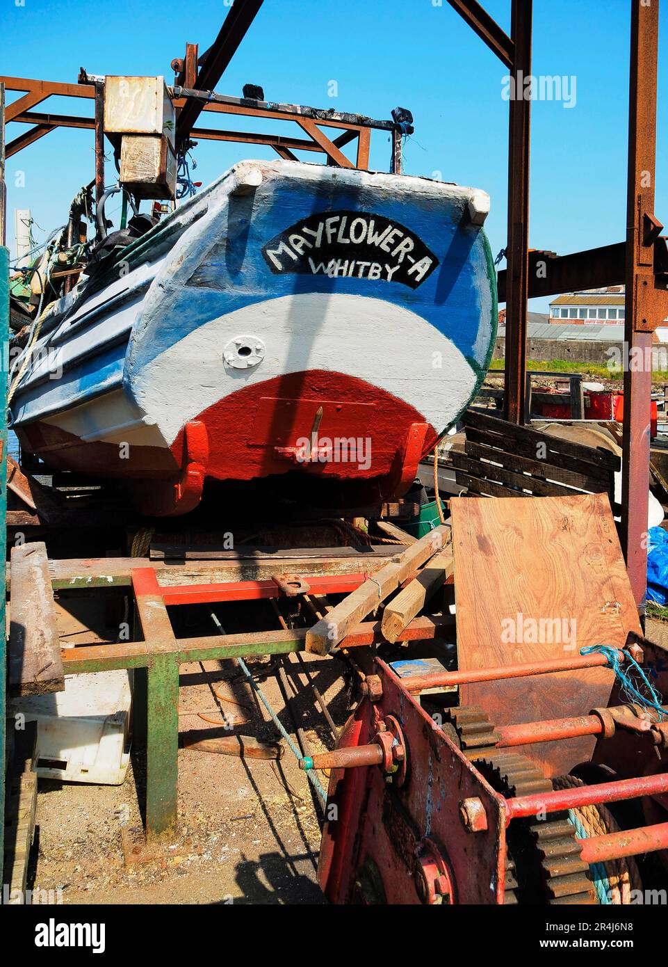 Fishing boat Mayflower A from Whitby, hauled out of the water in Paddy