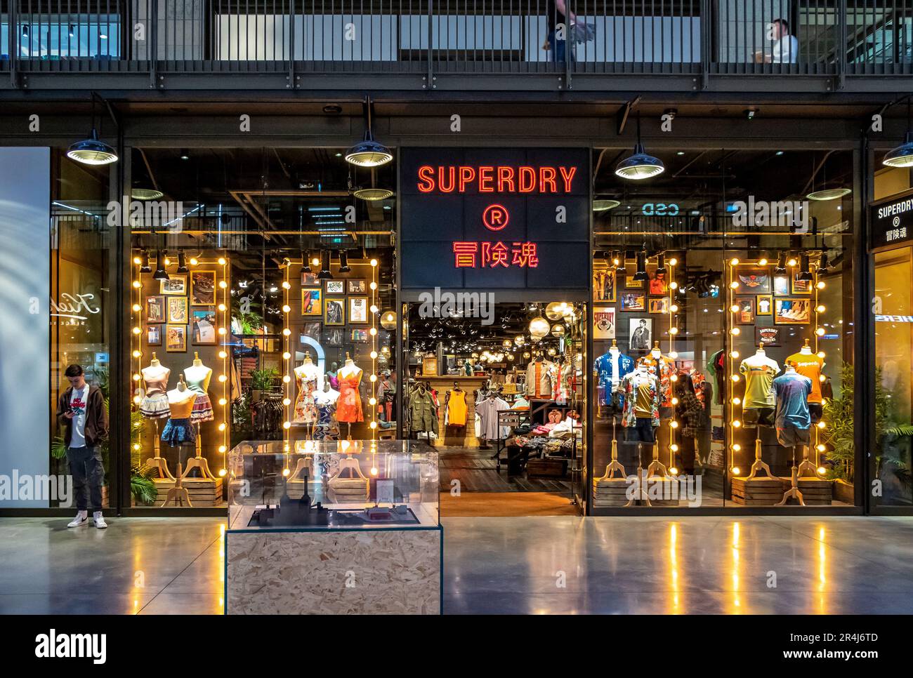 A Superdry store, a UK branded clothing company, inside the newly restored  Turbine Hall B on the ground floor at Battersea Power Station, London, SW11  Stock Photo - Alamy