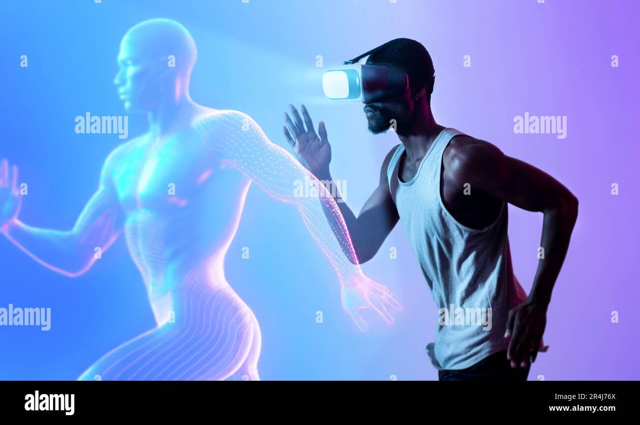 Fitness in metaverse. Sporty young black man in vr glasses playing ...