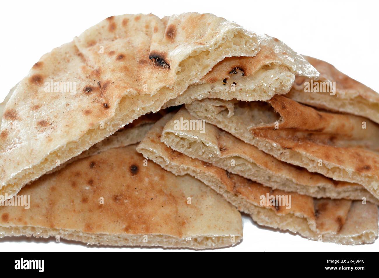 Traditional Egyptian flat bread with wheat bran and flour, regular Aish Baladi or Egypt bread baked in extremely hot ovens, it is the result of a mixt Stock Photo