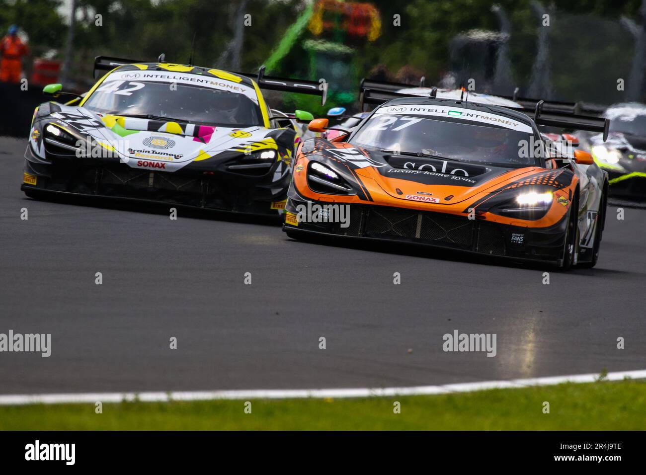 Donington Park circuit, Leicestershire. 28 May 2023. The #42 RACE LAB McLaren 720S GT3 Evo driven by Iain Campbell & James Kell GT3 Silver-Am class challenges The #27 Optimum Motorsport McLaren 720S GT3 Evo driven by Mark Radcliffe & Rob Bell GT3 Pro-Am class during round 4 of the Intelligent Money British GT Championship at Donington Park circuit, Leicestershire. 28 May 2023. Credit: Jurek Biegus/Alamy Live News Stock Photo