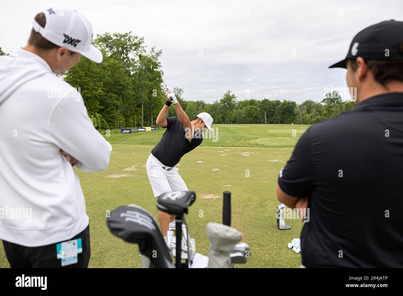 Danny Lee of Iron Heads GC hits his shot on the driving range during
