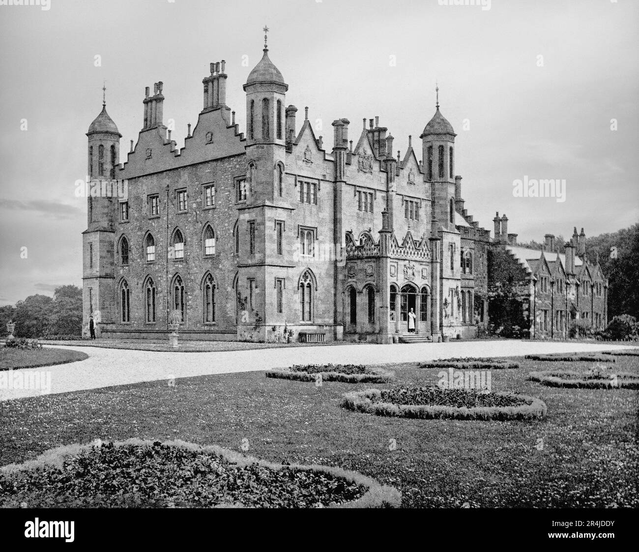 A late 19th century view of Glenarm Castle, Glenarm, County Antrim, Northern Ireland, The ancestral home of the Earl of Antrim, there has been a castle at Glenarm since the 13th century. The present castle dates from 1756, when Christopher Myers transformed the Jacobean ruin to a Palladian mansion, with further  Jacobean architectural additions made by later members of the family. Stock Photo