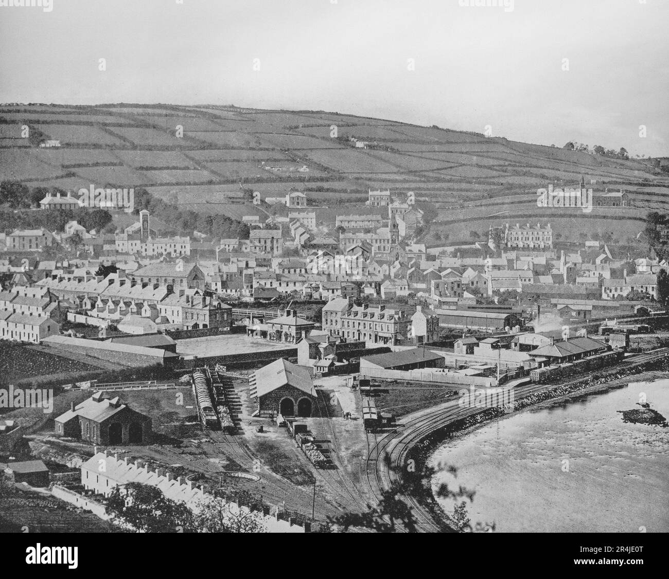 A late 19th century view of Larne, a town on the east coast of County Antrim, Northern Ireland. In 1315, Edward the Bruce of Scotland (brother of Robert the Bruce, King of Scotland), saw Ireland as another front in the ongoing war against Norman England, landed at Larne with his 6000 strong army en route to conquer Ireland. Following the 17th century Union of the Crowns of Scotland, England and Ireland under James VI & I many more settlers arrived in Ulster via Larne during the Plantation of Ulster. Later, during the 18th century many Scots-Irish emigrated to America from the port of Larne. Stock Photo