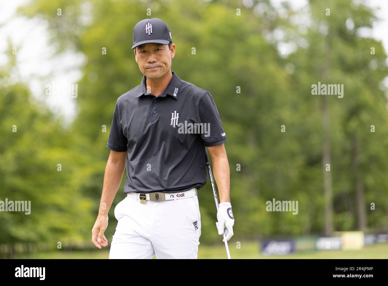 Captain Kevin Na of Iron Heads GC reacts on the driving range during