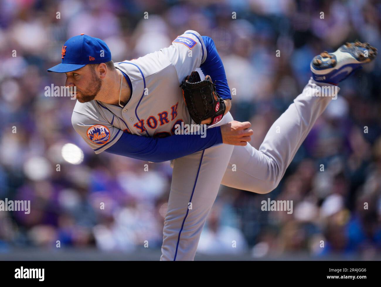 New York Mets starting pitcher Tylor Megill works against the Colorado
