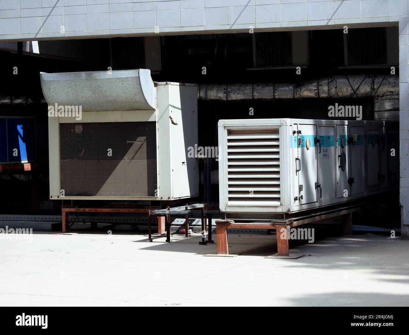 Cairo, Egypt, May 13 2023: External units of air conditioning system with the compressors, chillers, aeration and cooling system, selective focus of a Stock Photo