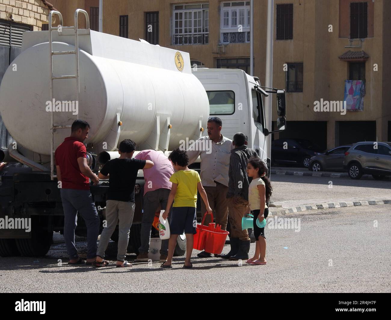 Cairo, Egypt, May 15 2023: A water tanker vehicle with clean water as an emergency service response in any area with water outage to deliver drinking Stock Photo
