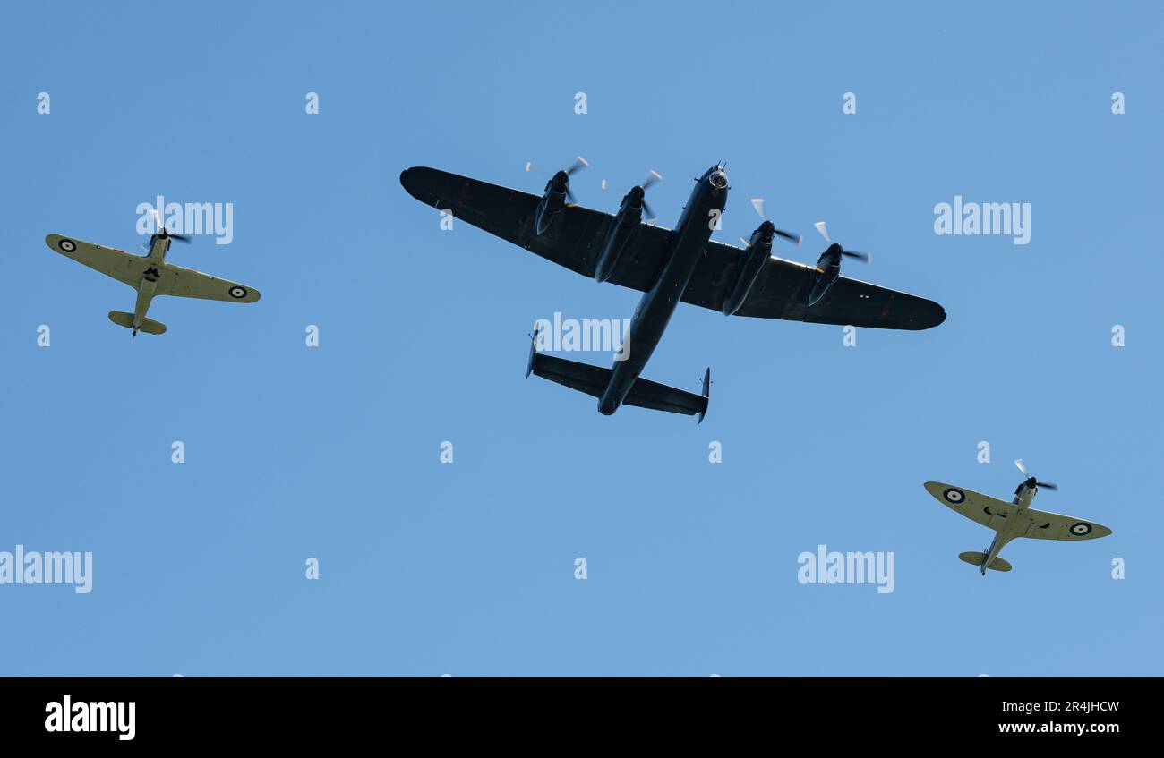 Liverpool Pier Head, Liverpool, Merseyside, England. 27th May 2023. Battle of Britain memorial fly performs a flypast with the Spitfire, Lancaster and Hurricane in formation over Liverpool, during the Battle of the Atlantic 80th anniversary at Pier Head. (Credit Image: ©Cody Froggatt/Alamy Live News) Stock Photo