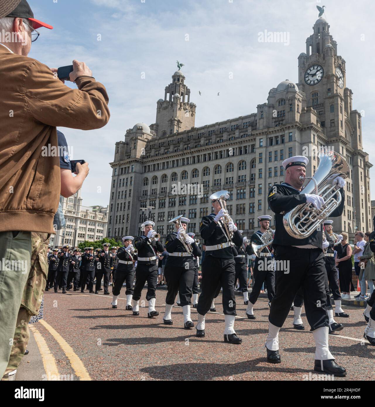 Liverpool Pier Head, Liverpool, Merseyside, England. 28th May 2023. Crowds watch on as the parade passes the Royal Liver Building, during the Battle of the Atlantic 80th anniversary at Pier Head. (Credit Image: ©Cody Froggatt/Alamy Live News) Stock Photo
