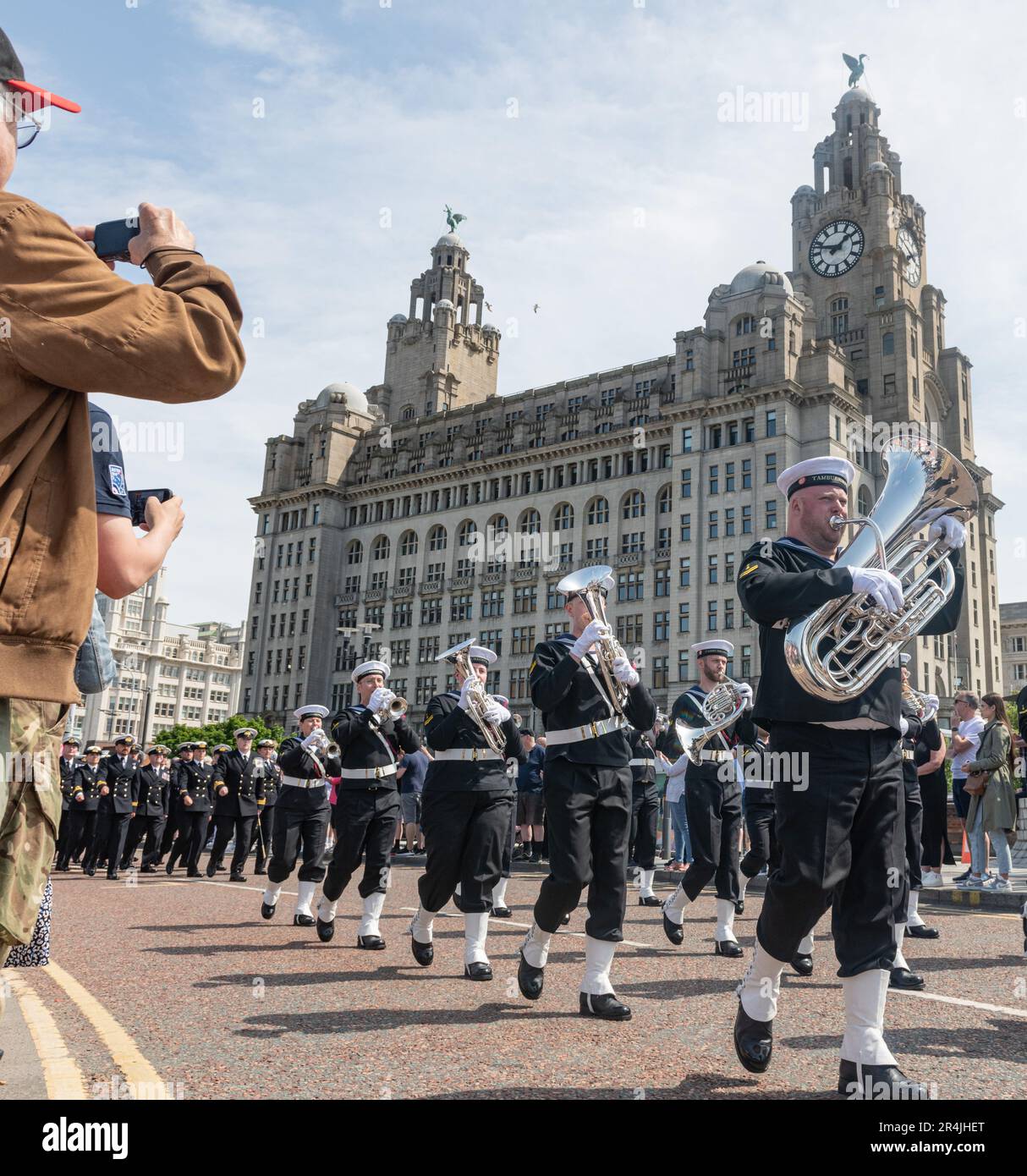 Liverpool Pier Head, Liverpool, Merseyside, England. 28th May 2023. Crowds watch on as the parade passes the Royal Liver Building, during the Battle of the Atlantic 80th anniversary at Pier Head. (Credit Image: ©Cody Froggatt/Alamy Live News) Stock Photo