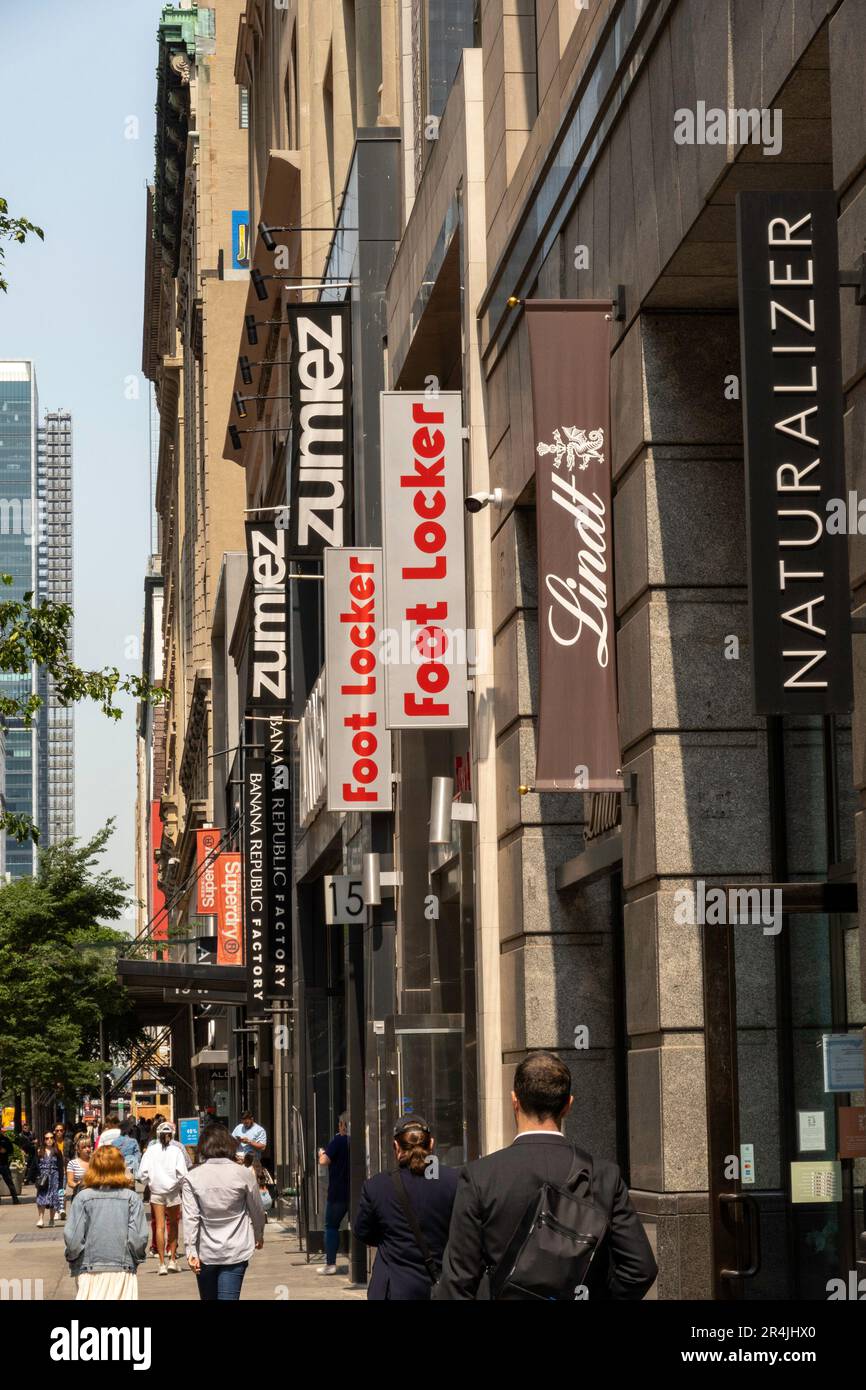 Retail Store Signs Line  West 34th Street, New York City, USA  2023 Stock Photo