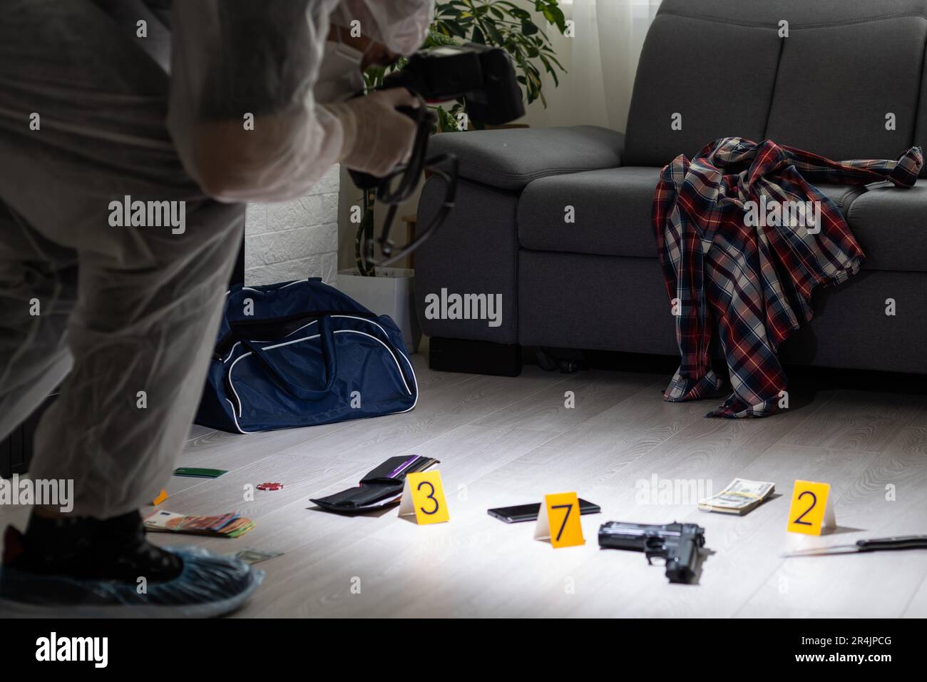Detective Collecting Evidence in a Crime Scene. Forensic Specialists