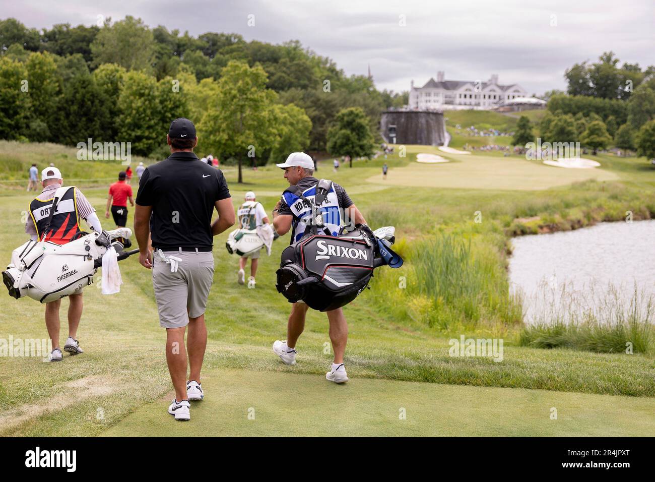 Captain Brooks Koepka of Smash GC walks towards the first hole during