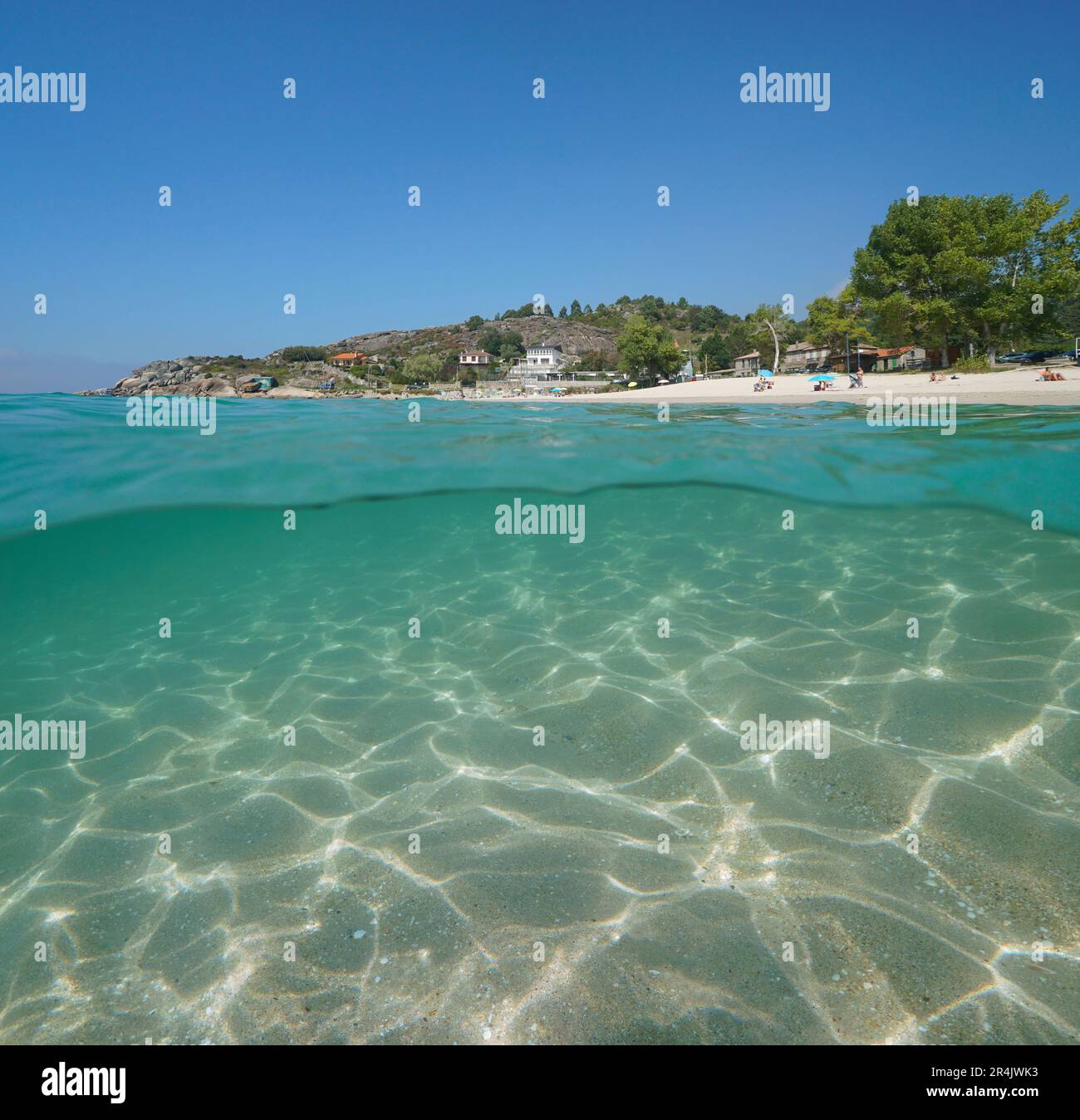 Atlantic coast beach with sand underwater in Spain, Galicia, split