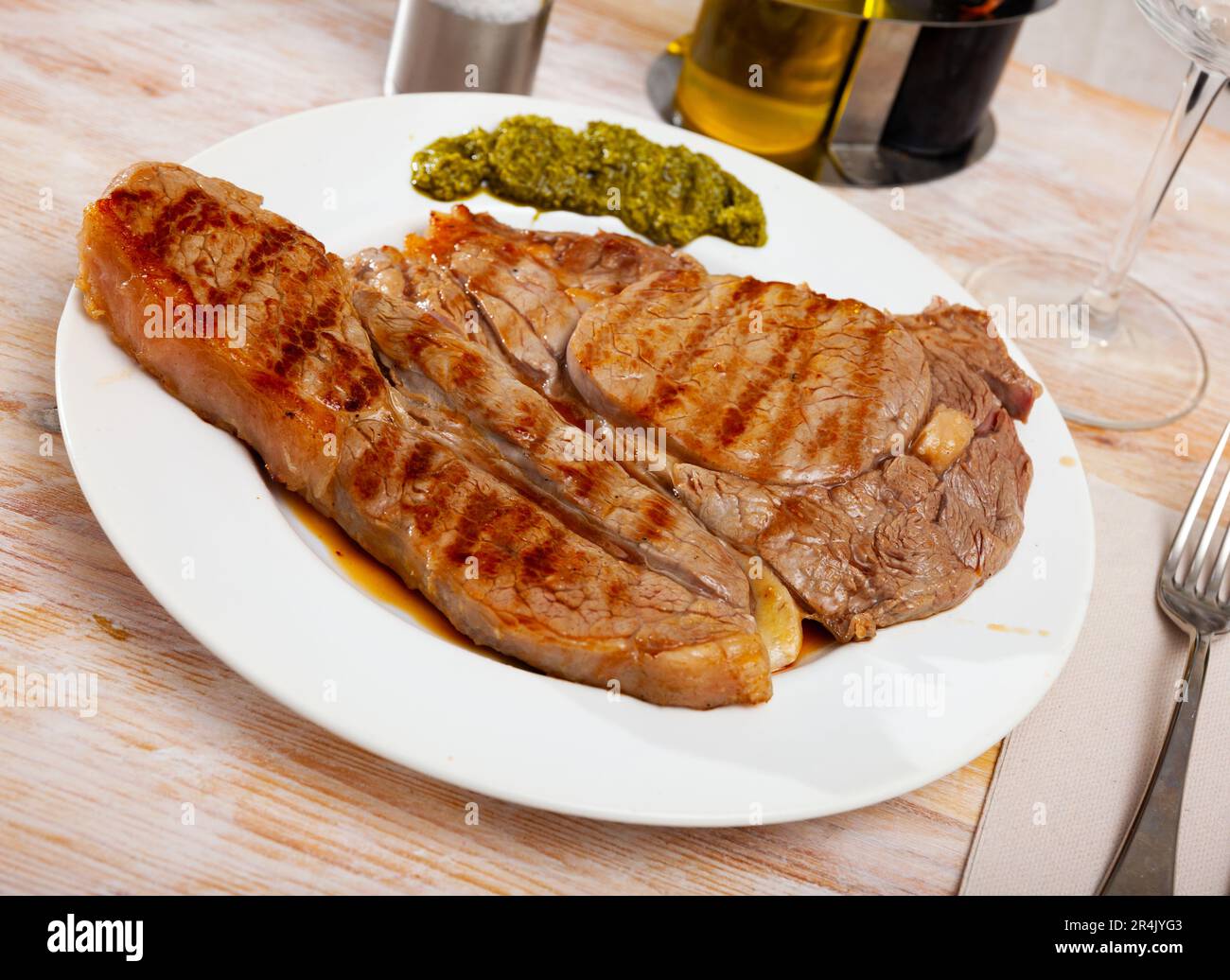 Grilled veal entrecote with pesto Stock Photo Alamy