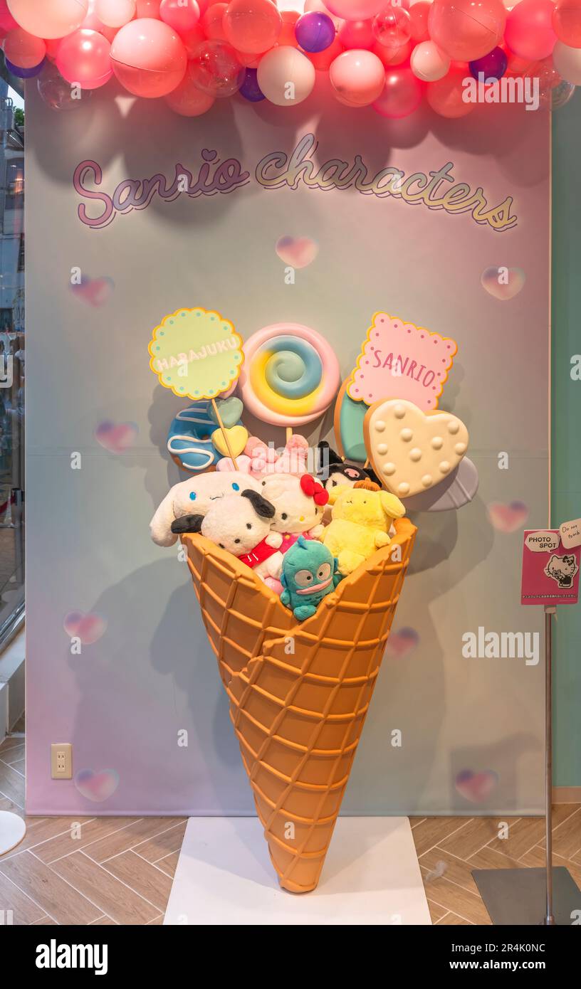 tokyo, harajuku - may 10 2023: Cute Cube store's photo spot depicting an ice cream cone with plushies of Sanrio characters Hello kitty, Cinnamoroll, P Stock Photo