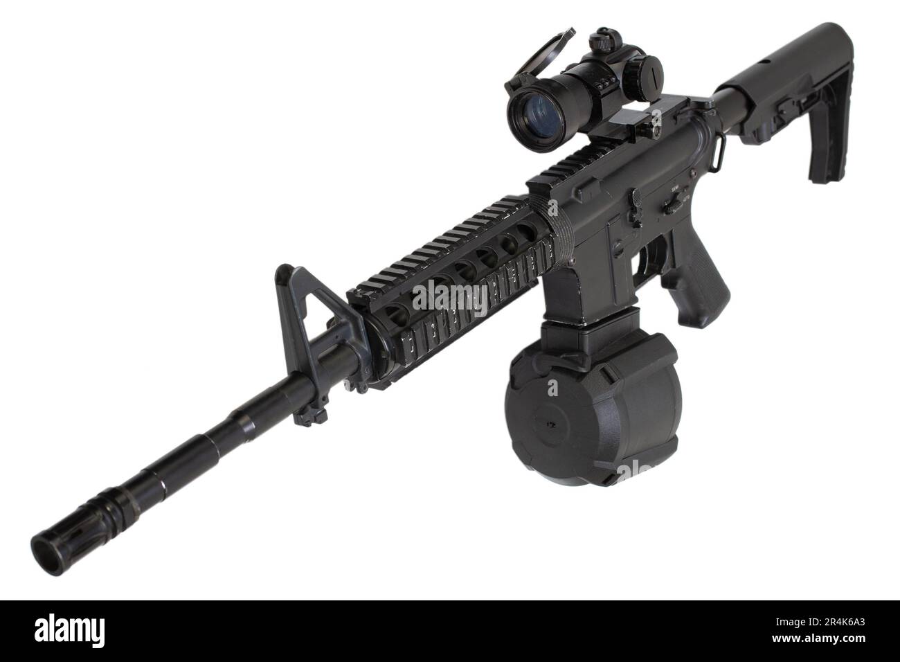 Assault rifle with drum magazine isolated on a white background Stock