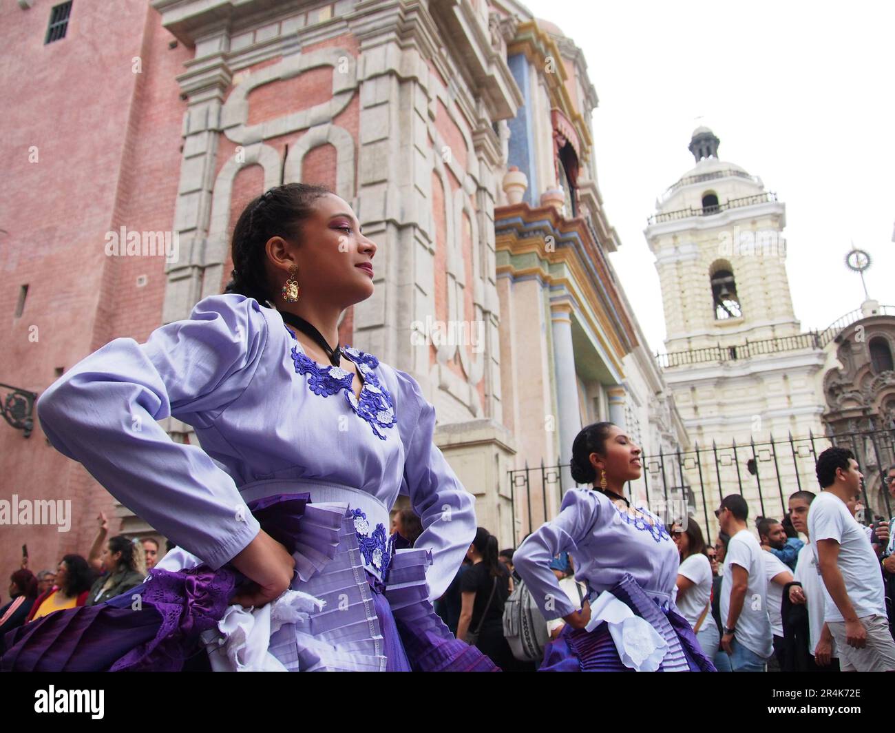 Lima, Peru. 28th May, 2023. Lima women in traditional costumes dancing 'Marinera' in the streets when Peruvian Indigenous folk dancers and Andean devotees wearing traditional costumes took to the streets of Lima downtown again to celebrate the Pentecost day. Pentecost is the Christian feast of the fiftieth day of Easter time that sets the solemn culmination of Easter itself. Credit: Fotoholica Press Agency/Alamy Live News Stock Photo