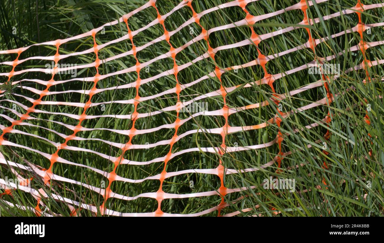 Orange plastic safety net Stock Photo