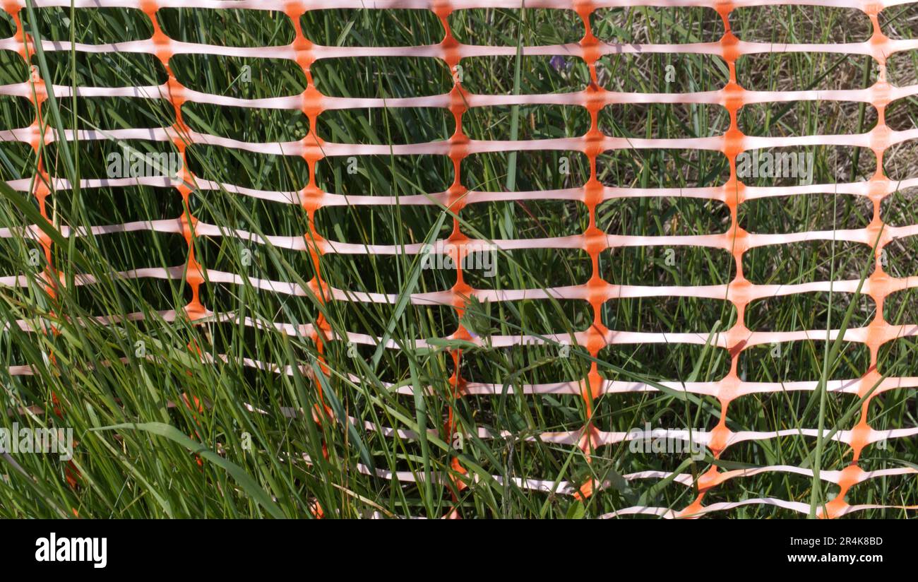 Orange plastic safety net Stock Photo