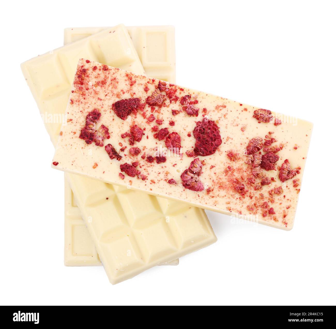 Chocolate bars with freeze dried raspberries on white background, top ...