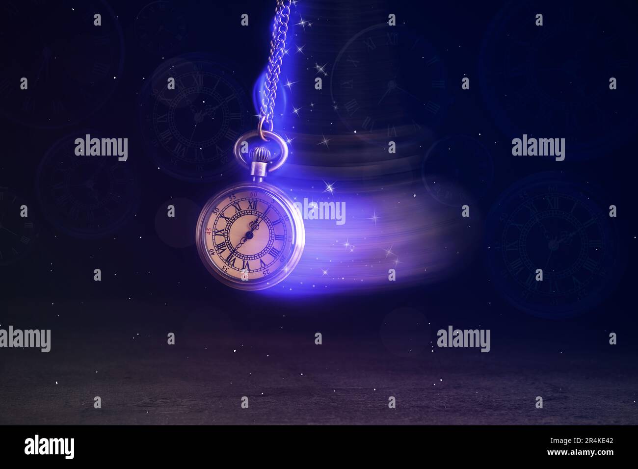 Hypnosis session. Vintage pocket watch with chain swinging over surface